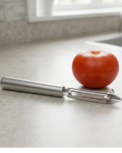 Zonva Softskin Stainless Steel Serrated Swivel Peeler 7.4 in - Lifestyle view